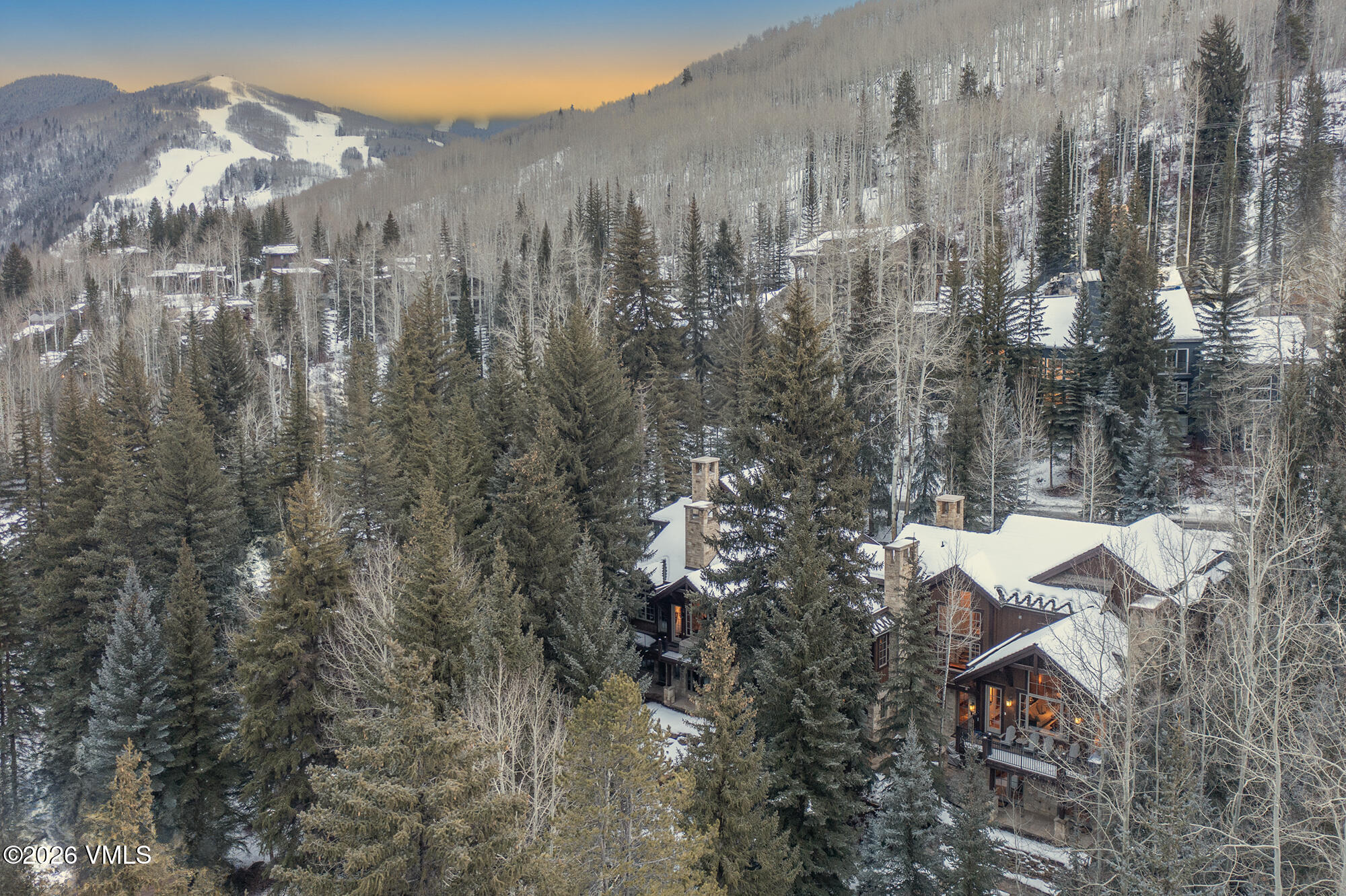 325 West Forest Road Vail, CO 81657 - Photo 31 of 33 a view of a house with a yard and mountain