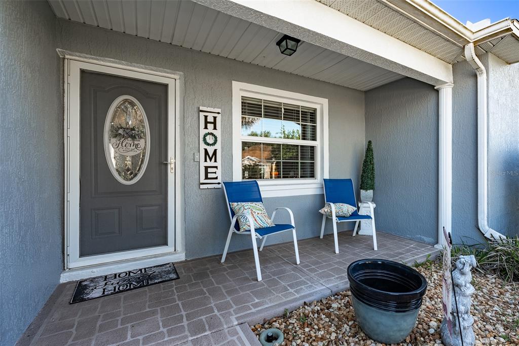 15143 Southwest 14th Avenue Road Ocala, FL 34473 - Photo 4 of 53 a dining room with a table and a chair