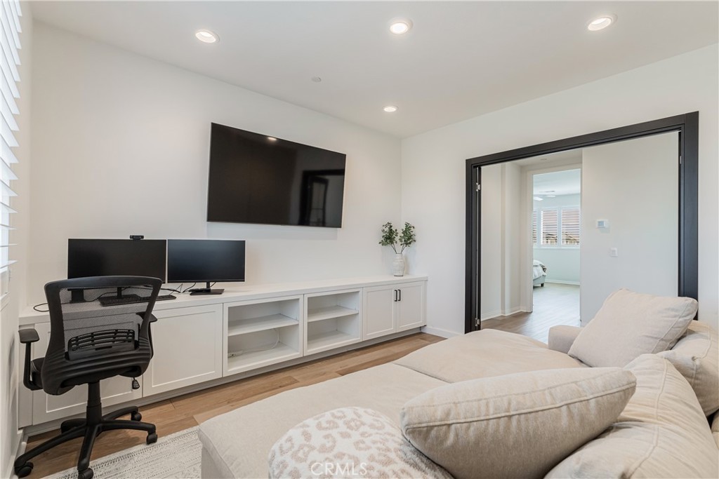 32067 Dawning Ridge Temecula, CA 92591 - Photo 20 of 73 a bedroom with a bed and a flat screen tv