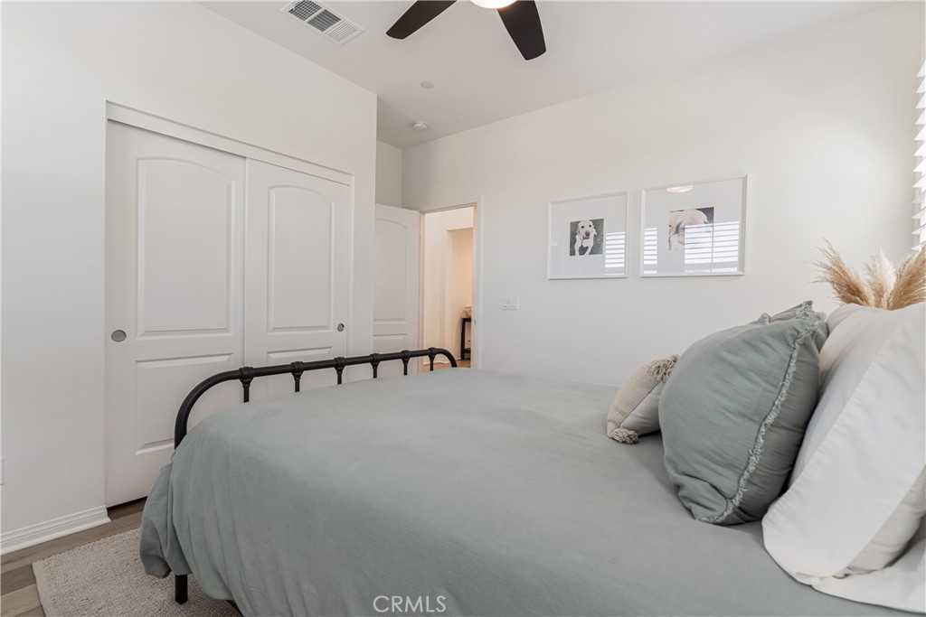 32067 Dawning Ridge Temecula, CA 92591 - Photo 31 of 73 a bed room with a bed and a chandelier