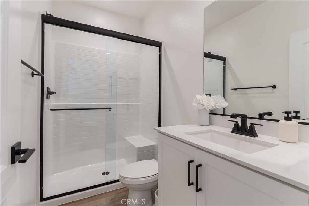 32067 Dawning Ridge Temecula, CA 92591 - Photo 33 of 73 a bathroom with a sink toilet and shower