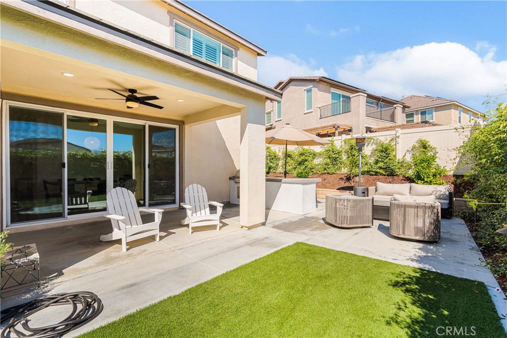 32067 Dawning Ridge Temecula, CA 92591 - Photo 40 of 73 a building outdoor space with patio furniture and potted plants
