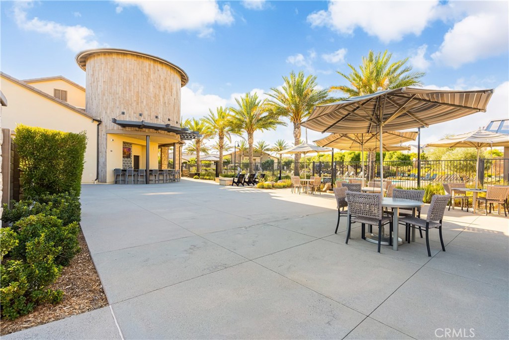 32067 Dawning Ridge Temecula, CA 92591 - Photo 46 of 73 a view of a patio with a table and chairs