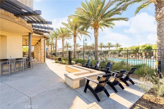 an aerial view of a swimming pool and mountain view