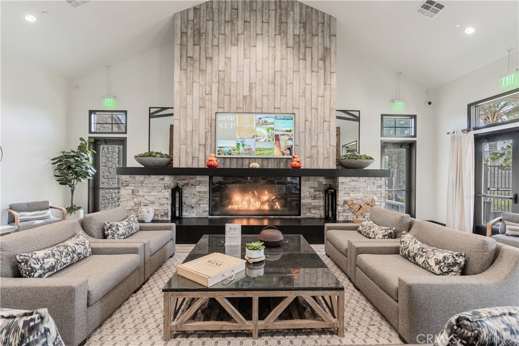 32067 Dawning Ridge Temecula, CA 92591 - Photo 61 of 73 a living room with furniture and a fireplace