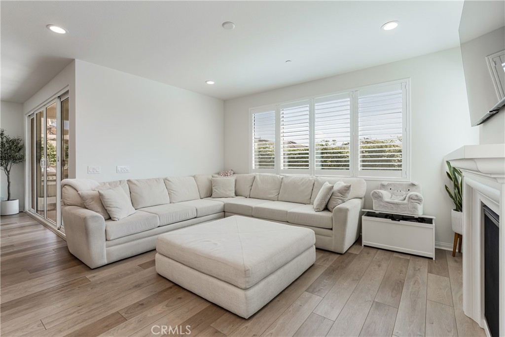 32067 Dawning Ridge Temecula, CA 92591 - Photo 7 of 73 a living room with furniture and a large window