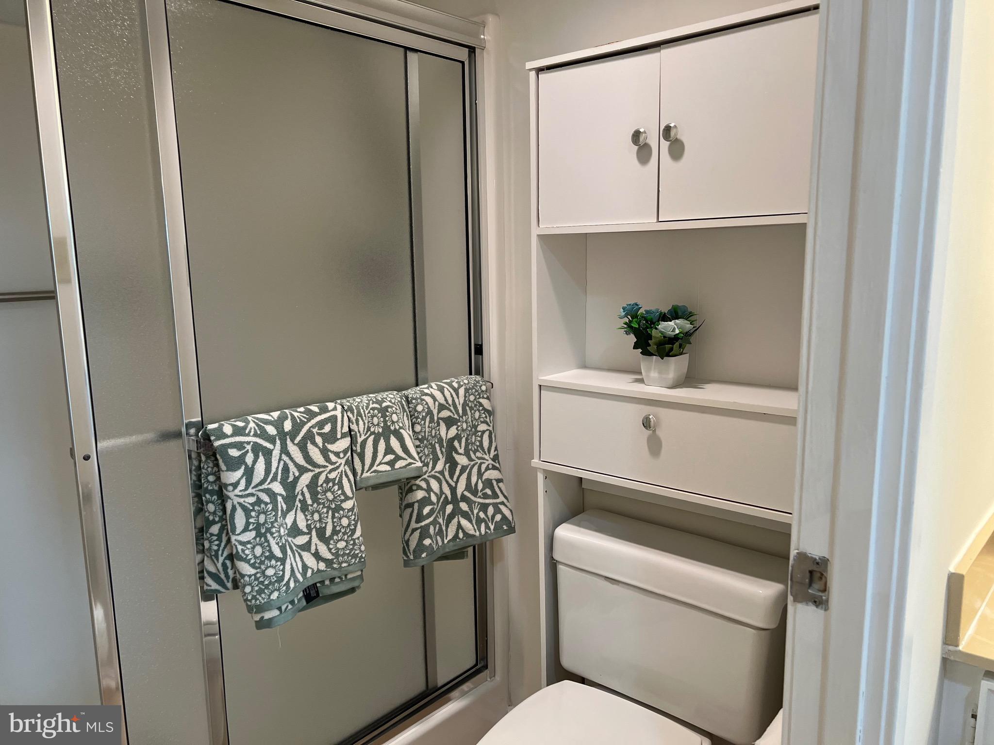 15100 Interlachen Drive, Unit 4709 Silver Spring, MD 20906 - Photo 13 of 22 a utility room with dryer and washer