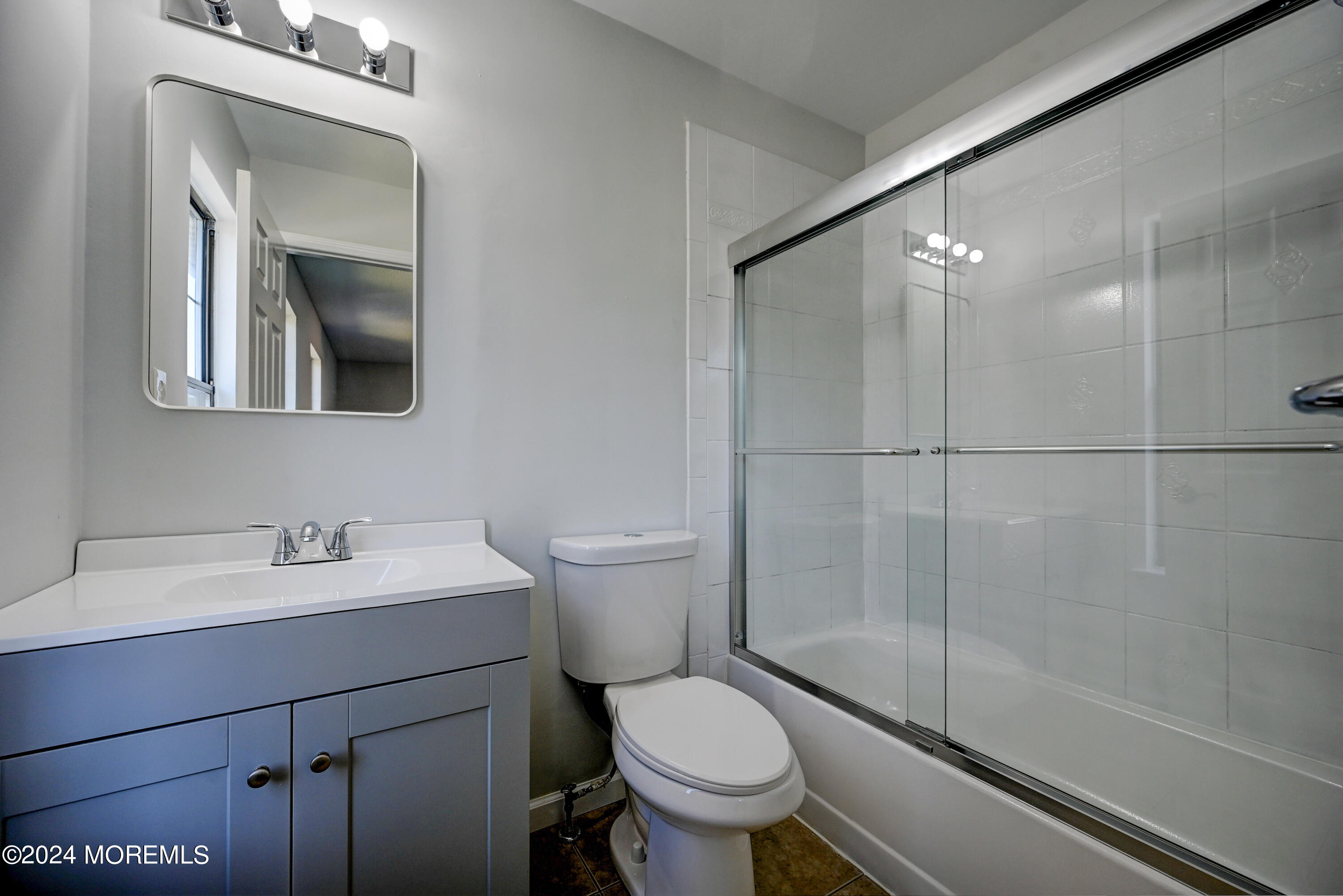 44 Mariners Cove Freehold, NJ 07728 - Photo 31 of 38 a bathroom with a sink toilet and shower