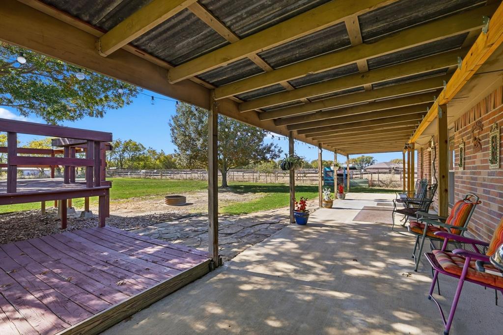 11649 Mitchell Circle Ponder, TX 76259 - Photo 29 of 38 a view of a swimming pool with a porch