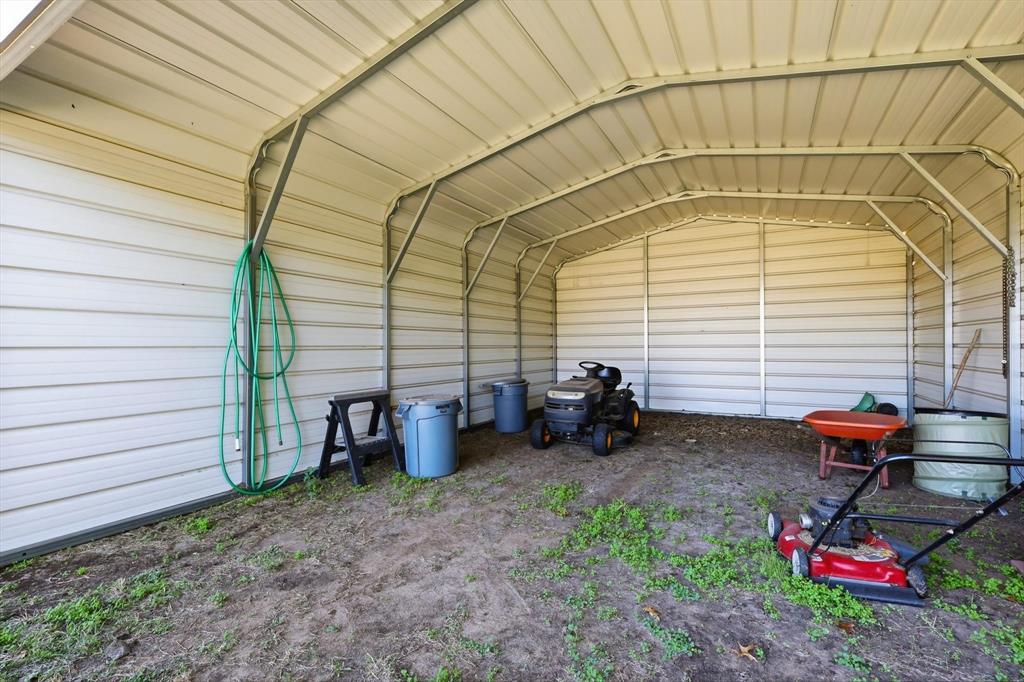 11649 Mitchell Circle Ponder, TX 76259 - Photo 35 of 38 a backyard of a house with outdoor seating