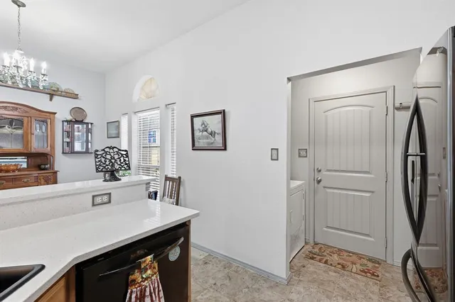 a bathroom with a sink a mirror and a shower