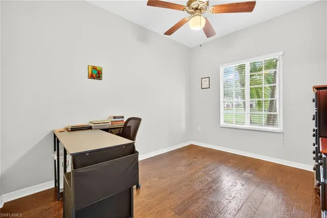 a room with a table and a window