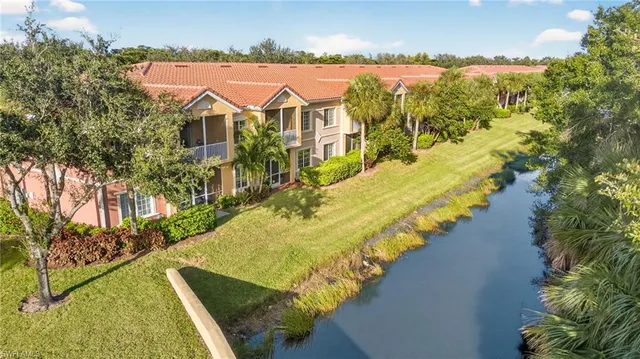 a view of a swimming pool with a lake view