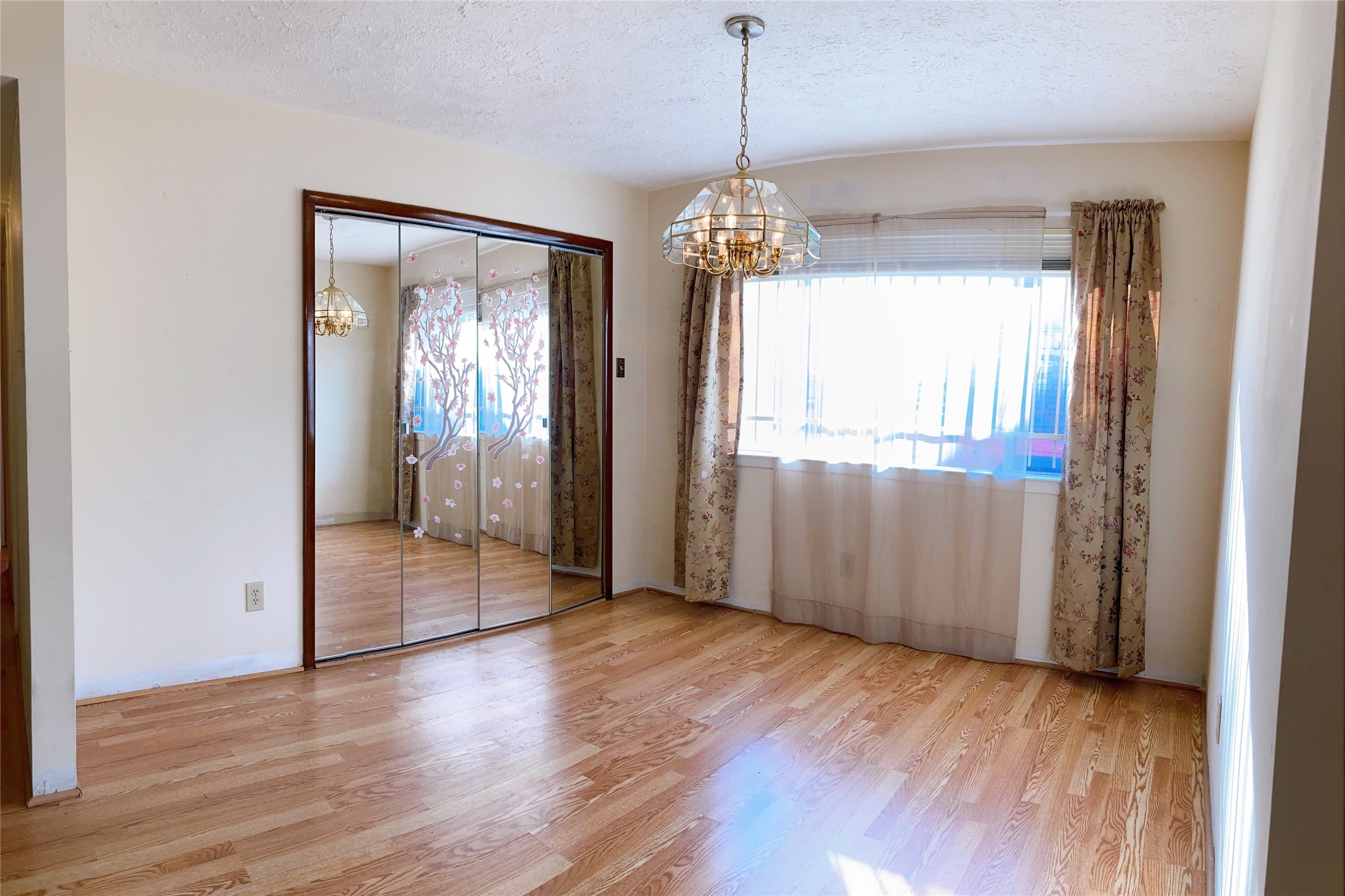 19518 Munsey Court Katy, TX 77449 - Photo 9 of 45 a view of a big room with wooden floor and stairs