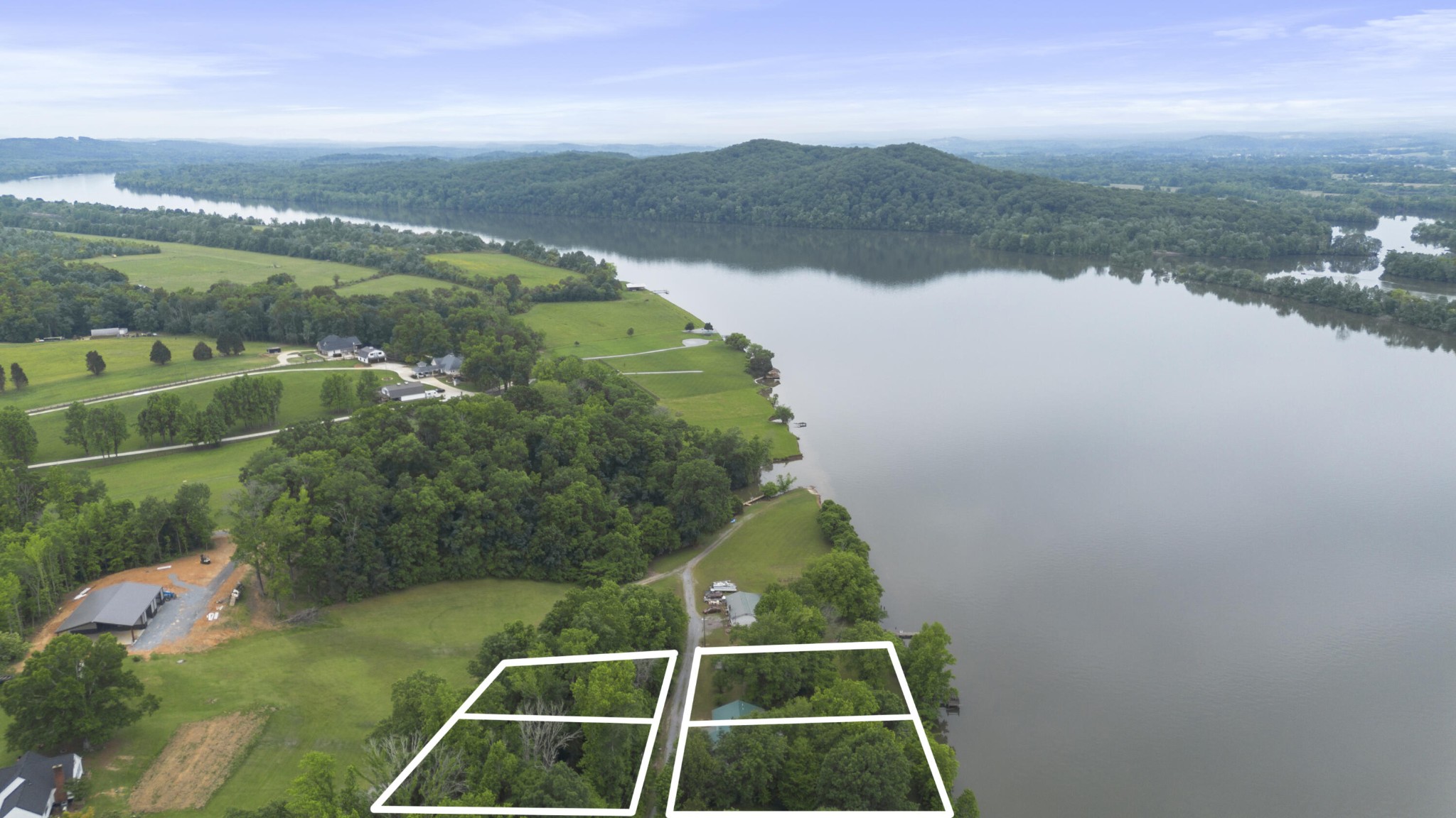 0 Hullander Lane Decatur, TN 37322 - Photo 3 of 6 a view of a swimming pool and lake view