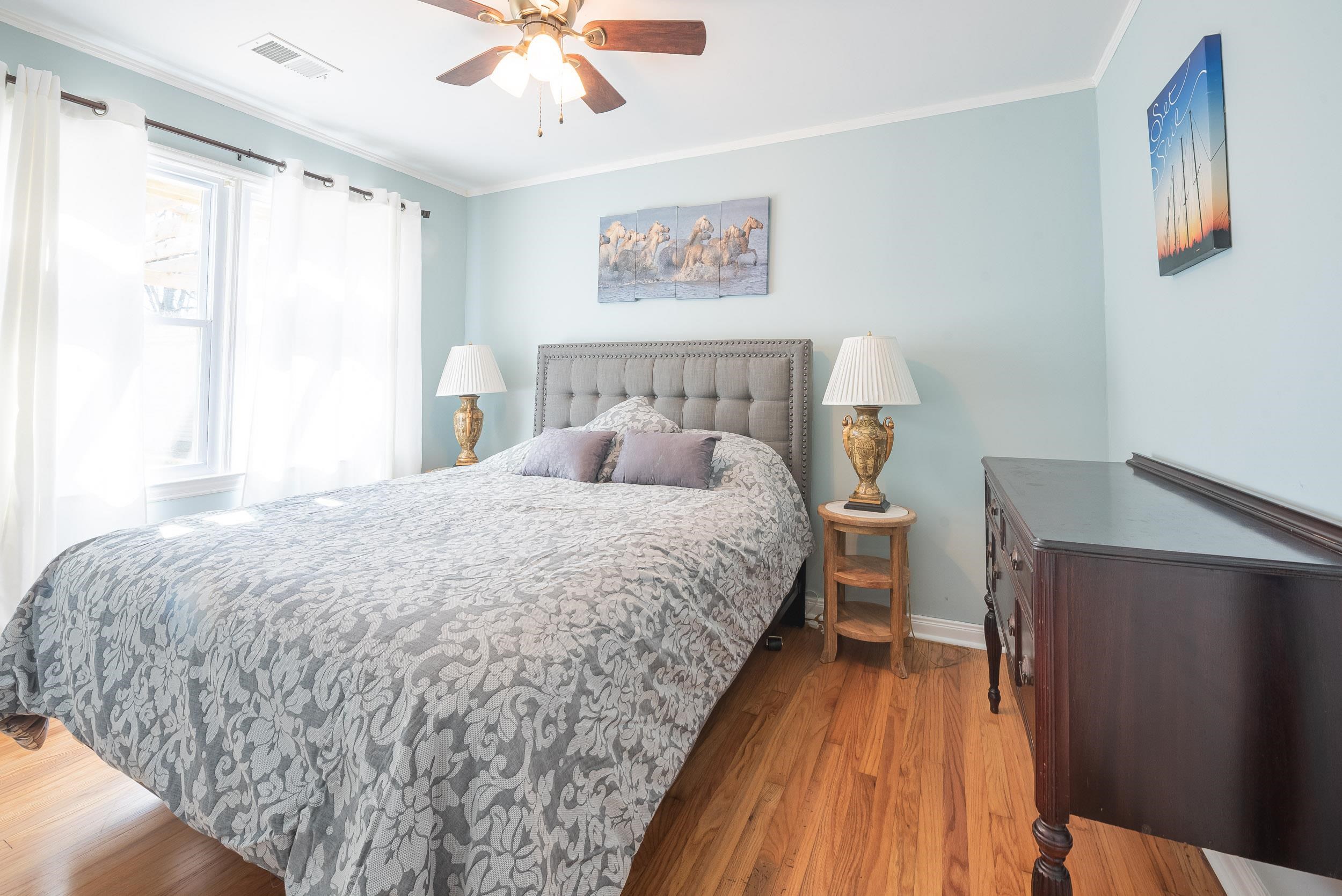 3805 Gamewell Road Memphis, TN 38111 - Photo 12 of 18 a bed sitting in a bedroom next to a window