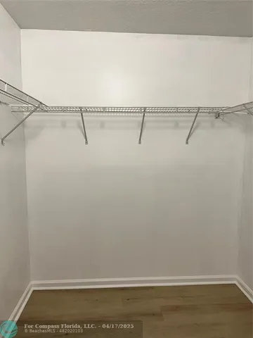 a view of a room with racks on the wall