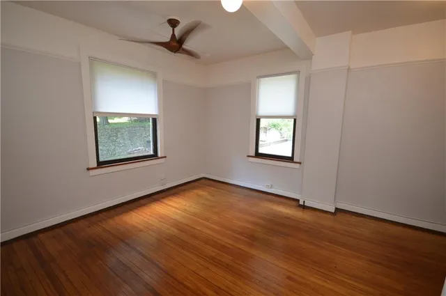 an empty room that has a window