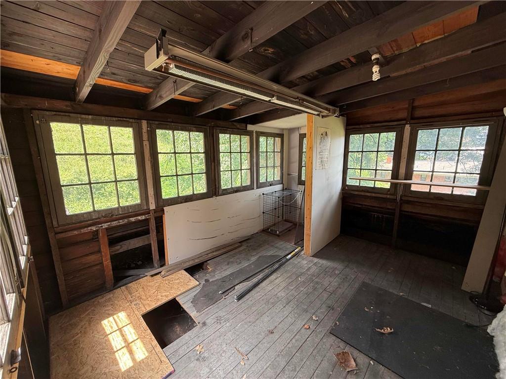 4323 Andover Terrace Pittsburgh, PA 15213 - Photo 39 of 48 a view of an empty room with wooden floor and a window