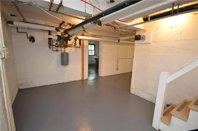 a view of a room with wooden walls