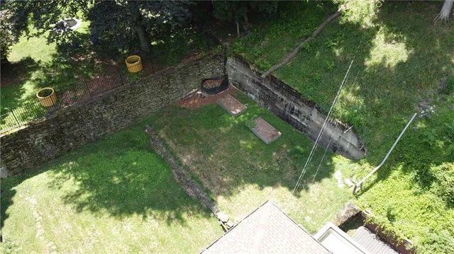 a backyard of a house with lots of green space