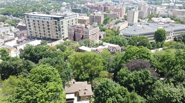 an aerial view of residential house and outdoor space