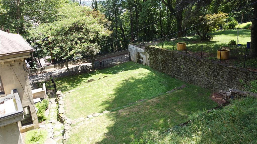 4323 Andover Terrace Pittsburgh, PA 15213 - Photo 47 of 48 a backyard of a house with yard and outdoor seating