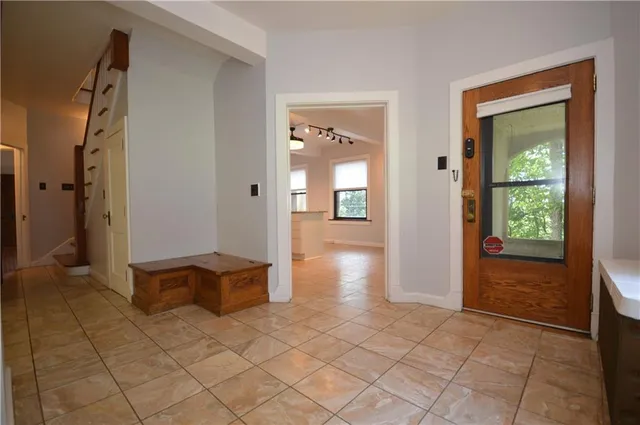 wooden floor with a bedroom