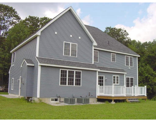 57 Ramshorn Road Charlton, MA 01507 - Photo 3 of 12 a front view of a house with a yard
