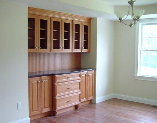 57 Ramshorn Road Charlton, MA 01507 - Photo 7 of 12 a kitchen with a stove and wooden floor