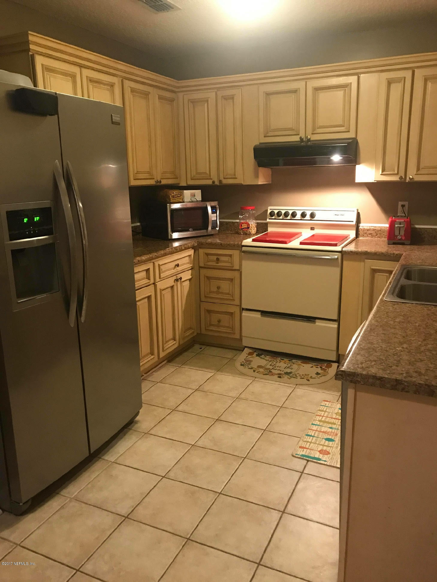 86054 Spring Meadow Avenue Yulee, FL 32097 - Photo 12 of 28 SM Kitchen 3
