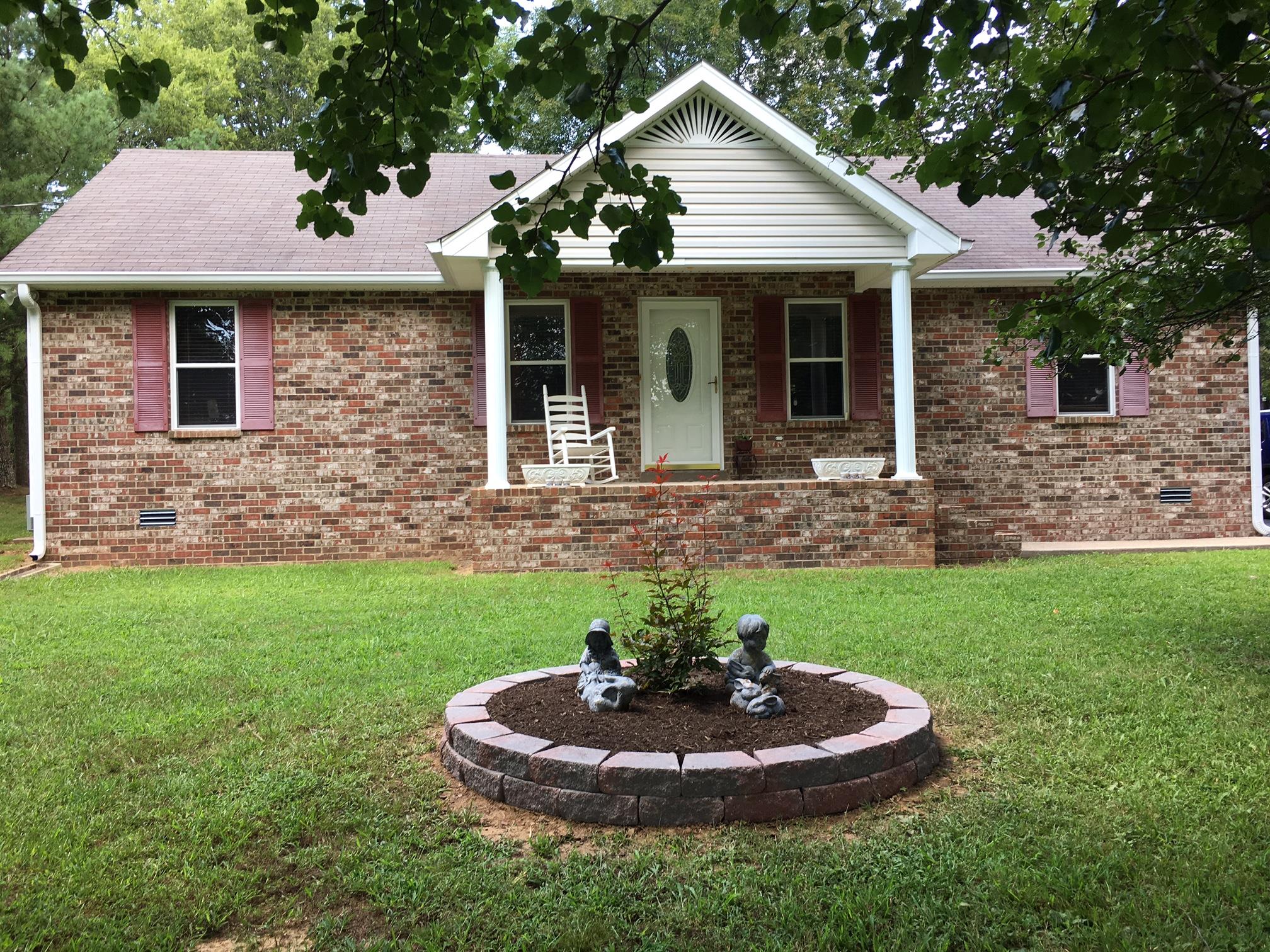 2055 Holloway Road Lebanon, TN 37090 - Photo 1 of 10 a front view of a house with a yard