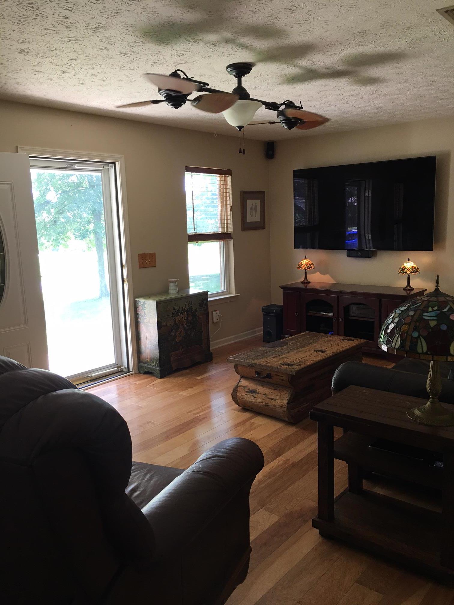 2055 Holloway Road Lebanon, TN 37090 - Photo 2 of 10 a living room with furniture and a flat screen tv