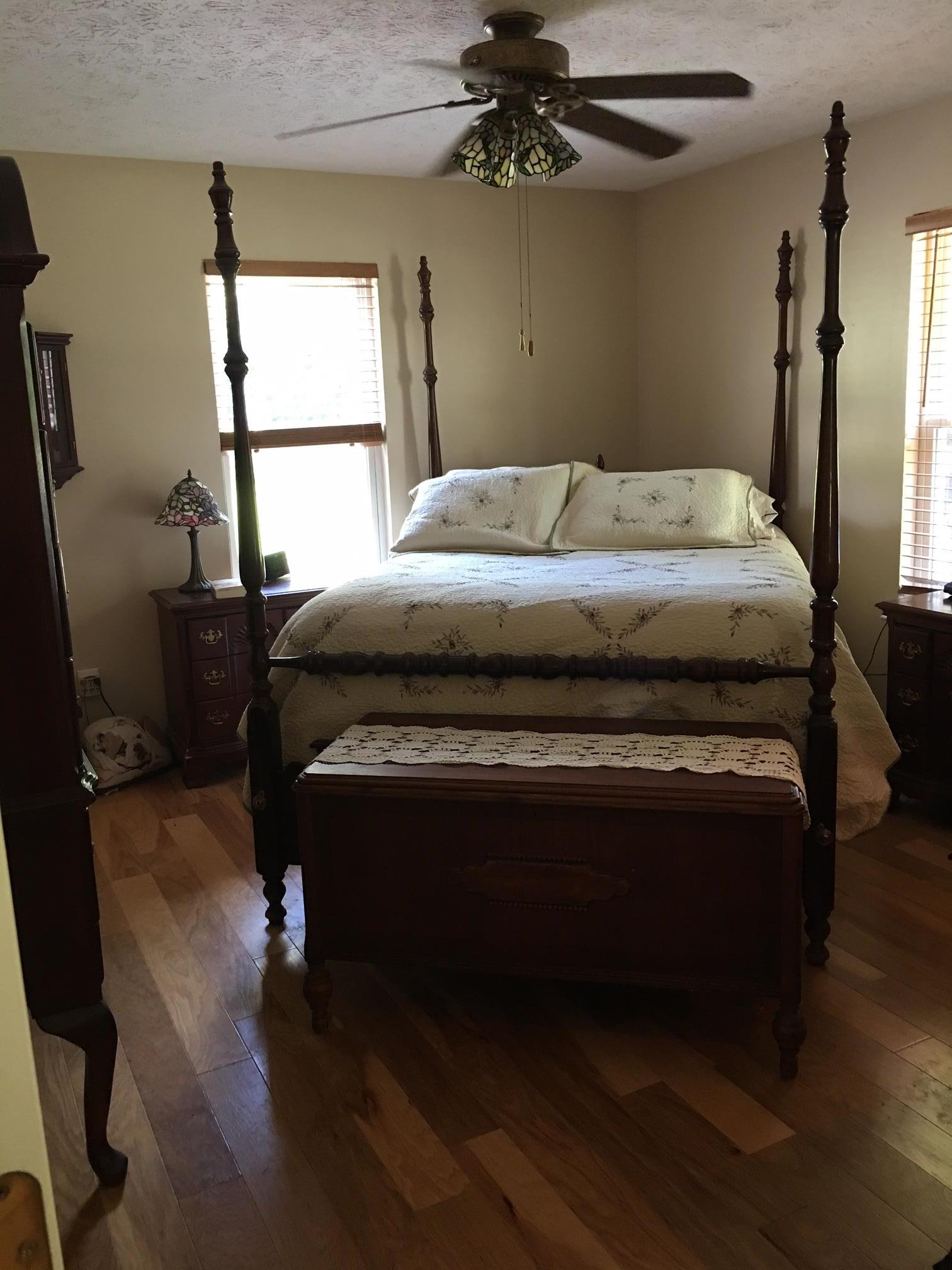 2055 Holloway Road Lebanon, TN 37090 - Photo 3 of 10 a bedroom with a bed and wooden floor