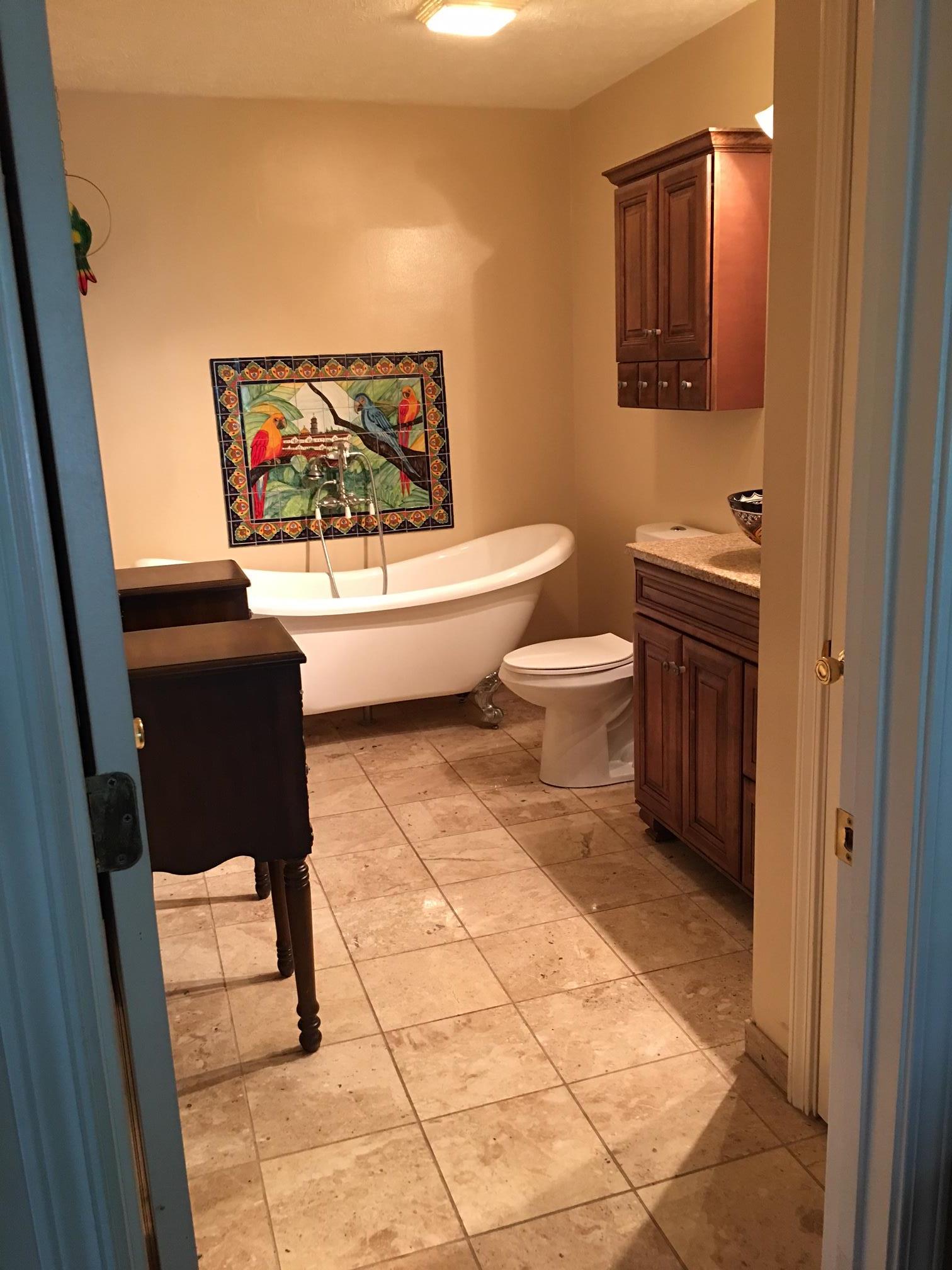 2055 Holloway Road Lebanon, TN 37090 - Photo 5 of 10 a bathroom with a toilet a sink and mirror