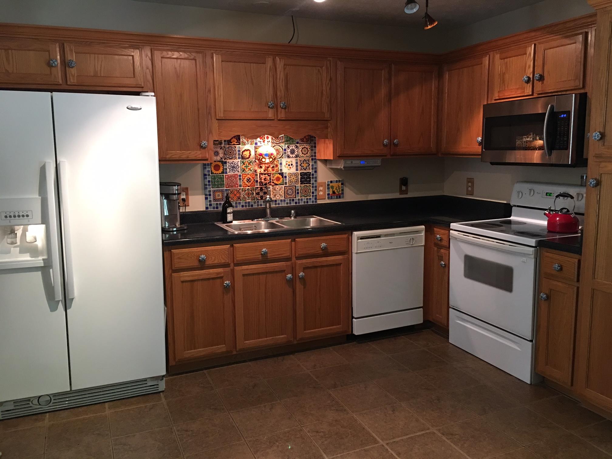 2055 Holloway Road Lebanon, TN 37090 - Photo 7 of 10 a kitchen with a sink stove and refrigerator