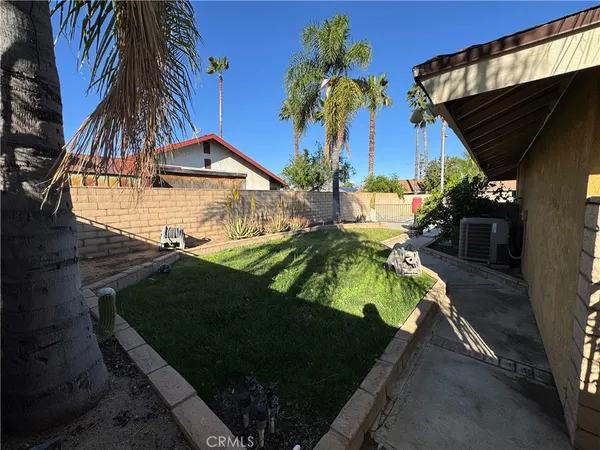 a view of a backyard with a tub