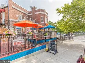 a view of a balcony with a patio