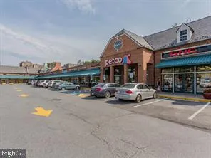 a view of a car park in front of a building