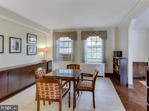 2737 Devonshire Place Northwest, Unit 129 Washington, DC 20008 - Photo 5 of 30 a dining room with furniture and window