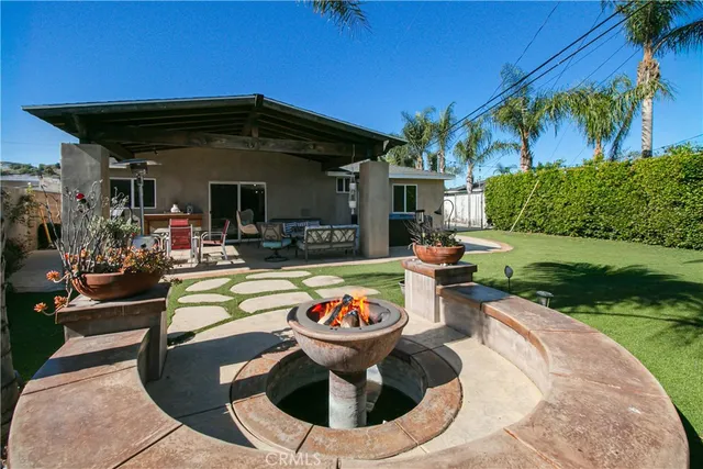 a view of a swimming pool with a patio