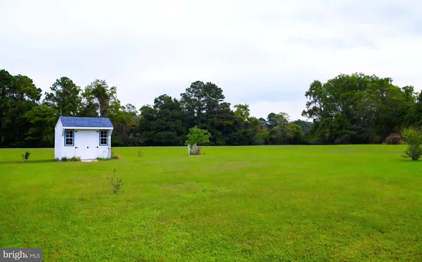 a view of a house with a big yard