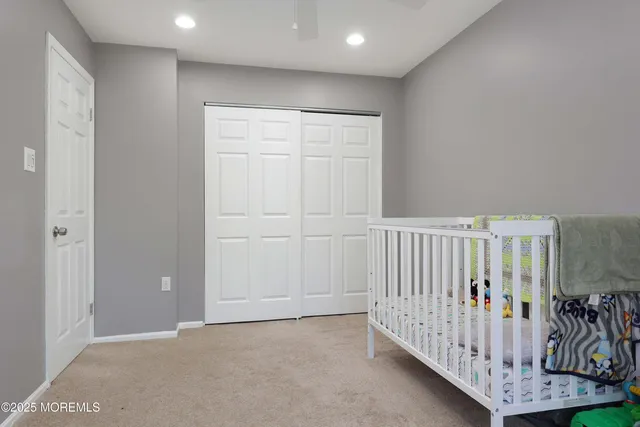 a view of a hallway with a livingroom