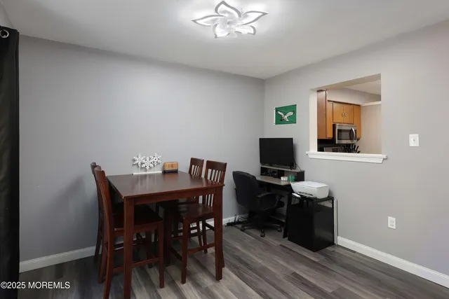 a view of a workspace with furniture