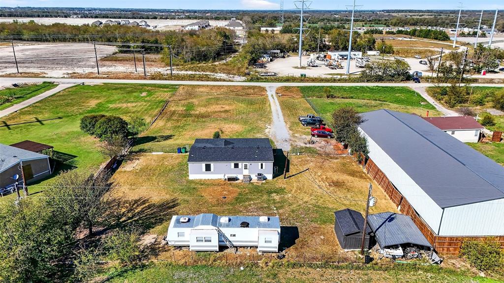 1918 East Foster Crossing Road Anna, TX 75409 - Photo 4 of 27 an aerial view of a house with a ocean view