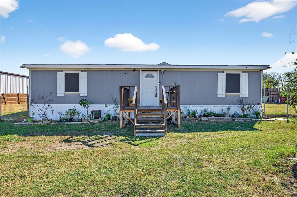 1918 East Foster Crossing Road Anna, TX 75409 - Photo 7 of 27 a front view of a house with garden