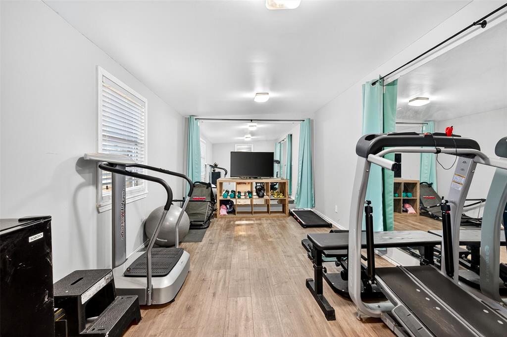 1918 East Foster Crossing Road Anna, TX 75409 - Photo 8 of 27 a view of a room with gym equipment