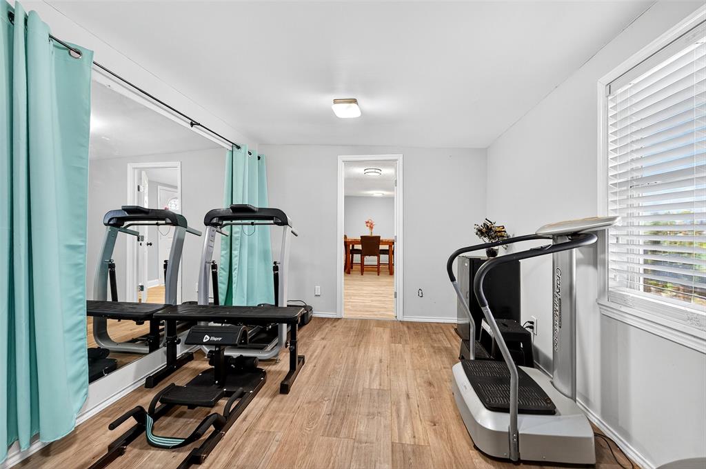 1918 East Foster Crossing Road Anna, TX 75409 - Photo 9 of 27 a view of a room with gym equipment