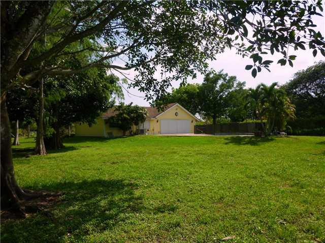 9229 Northwest 66th Lane Parkland, FL 33067 - Photo 4 of 14 Exterior Front
