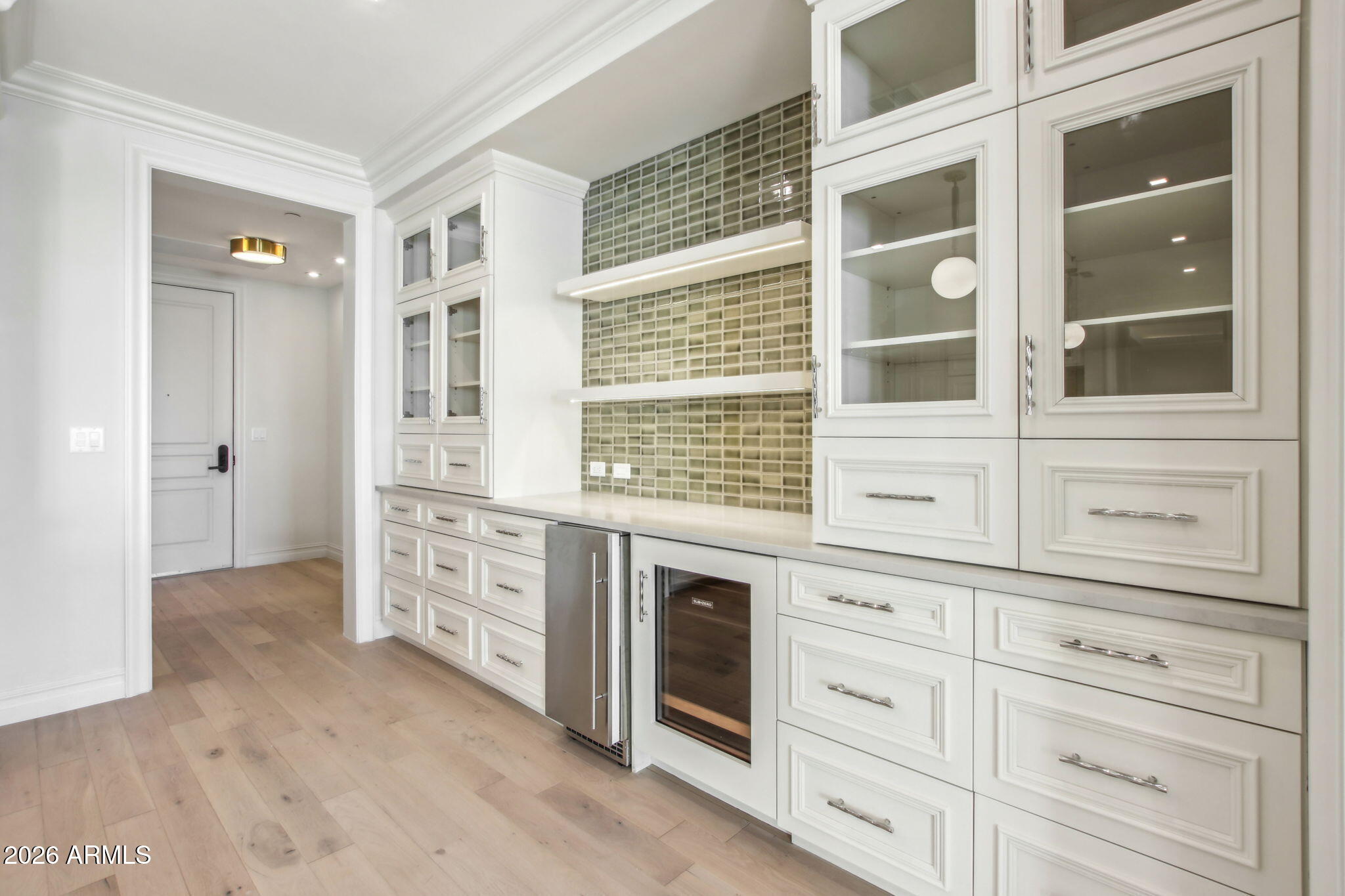 4240 East Camelback Road, Unit 514 Phoenix, AZ 85018 - Photo 4 of 16 a view of white cabinets with windows